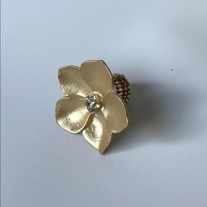 Adjustable costume ring with big gold flower